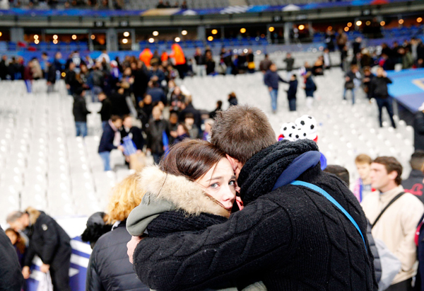 Spectators scampering inside Stade de France
