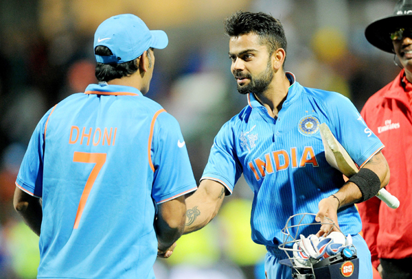 Dhoni and Kohli celebrate a win