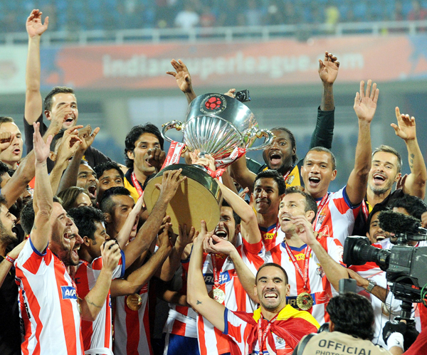 Atletico de Kolkata with 2014 ISL trophy