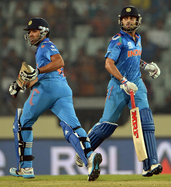 Kohli and Rohit running between the wickets