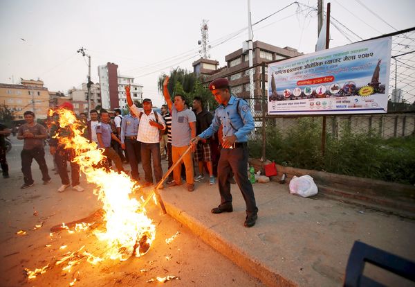 Nepal protests modi effigy