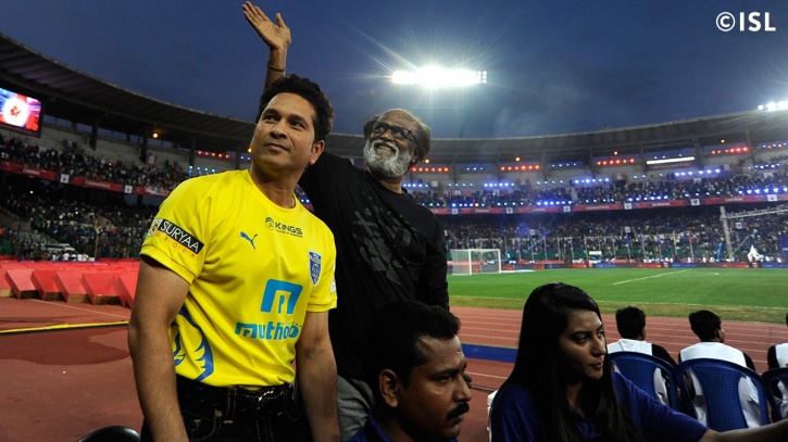Sachin Tendulkar and Rajnikanth share a buggy ride during the 2015 ISL opening ceremony