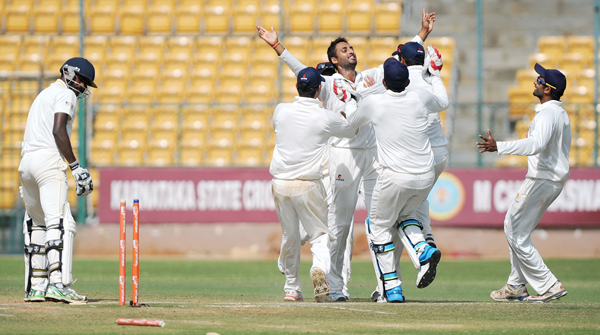 Sreenath Aravind celebrates a wicket in Ranji Trophy