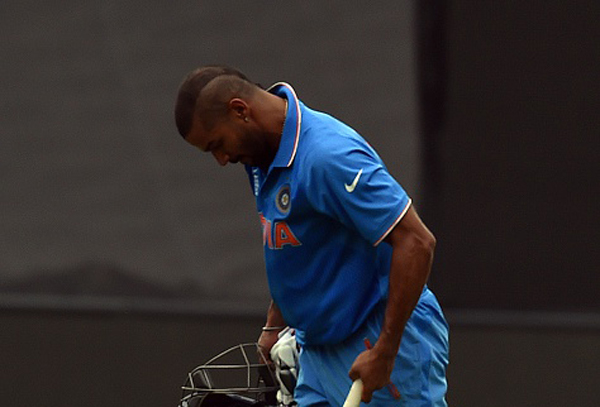 Shikhar Dhawan is out