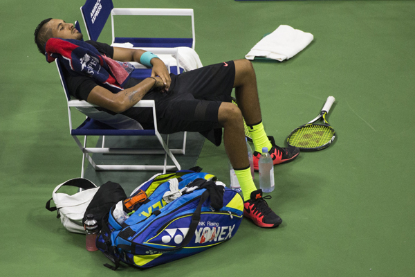Nick Kyrgios resting during his US Open Round 1 match vs Andy Murray