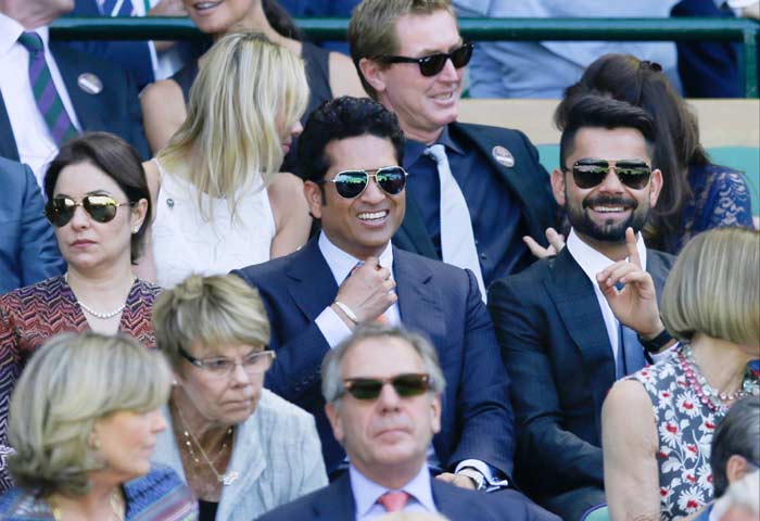 Kohli with Sachin watching Federer at Wimbledon
