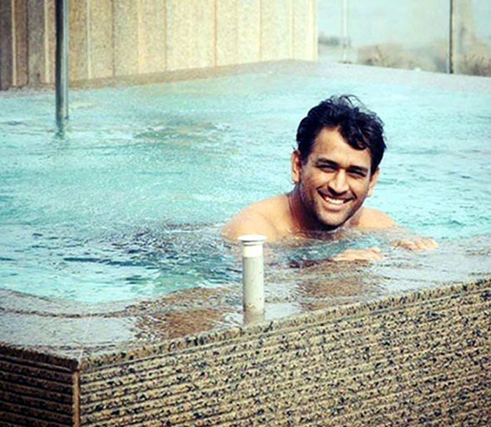 Dhoni in a swimming pool