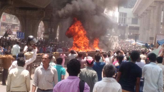 Cars And Buses Are Being Set On Fire In Bengaluru As Garment Workers Fight New EPF