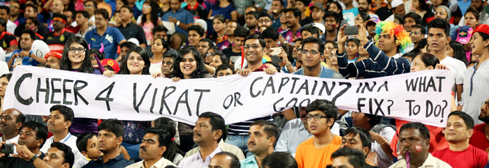 Kohli vs Dhoni banner