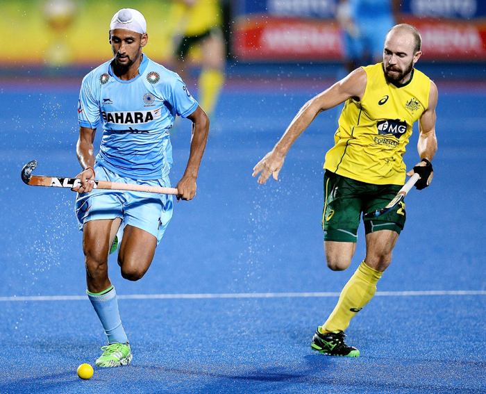 Mandeep vying for the ball