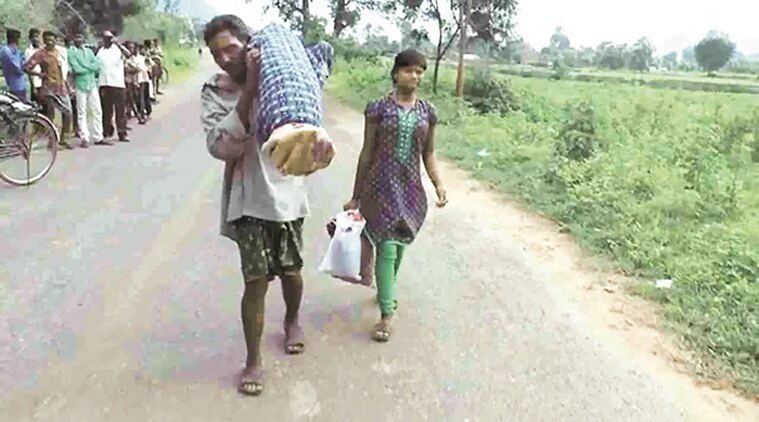 Man Carrying Dead Wife