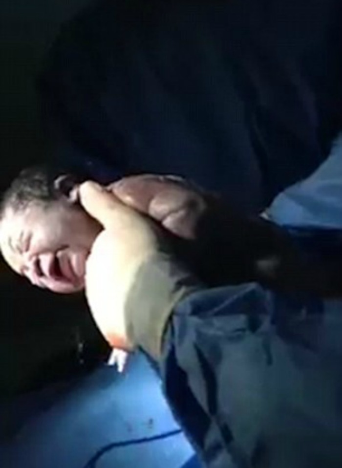baby born in amniotic sac