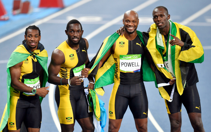Bolt (right) with his Jamaican teammates