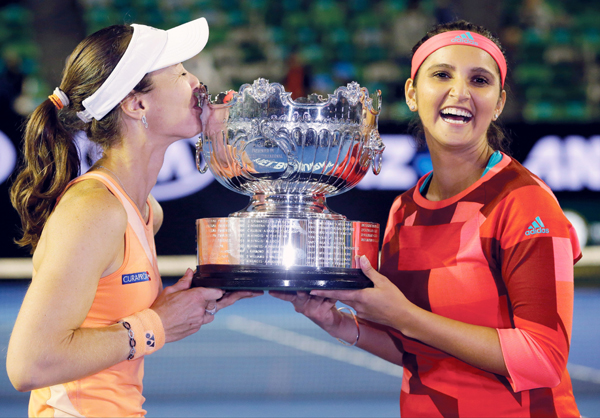 Sania and Hingis with the Australian Open trophy