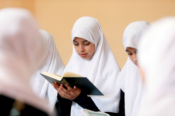Muslim girl studying