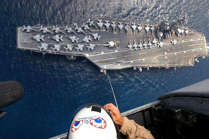 Warplanes Take Off To Fight ISIS From This Ship. It Has Starbucks, Salons