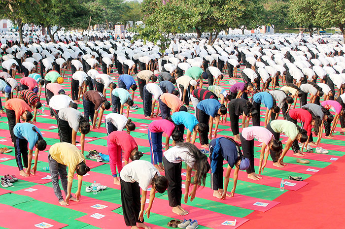 This Is How A Gujarat School 

Principal Used Yoga To Transform A Notorious Village 