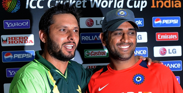 Afridi with Dhoni