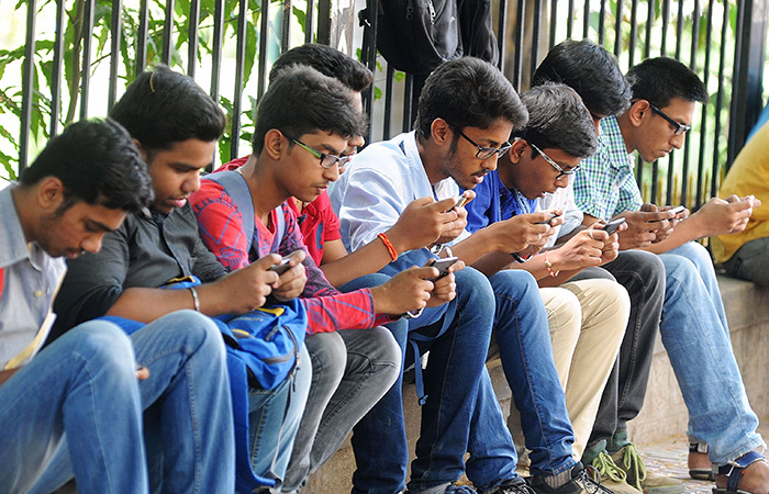 Youth Using Mobile Phone