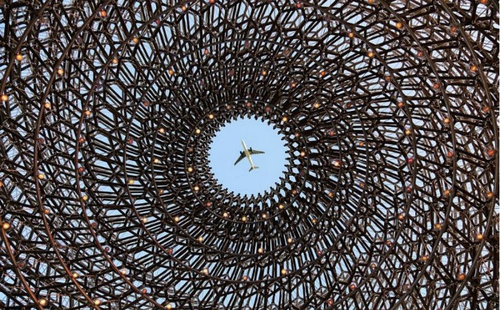 Plane through a metal beehive
