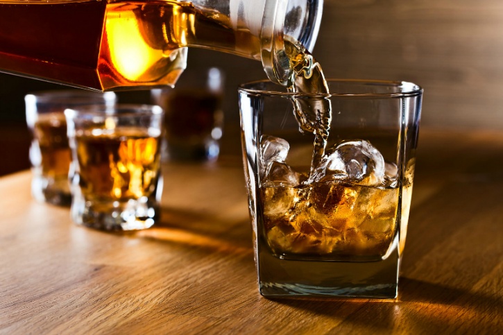 Researchers at the Linnaeus University in Sweden carried out a test to examine how compounds such as guaiacol in whiskey moved around with the presence of water in it.  Adding water to your drink frees guaiacol from its entrapments and enhances its smell and taste! The flavour in whiskey comes from the molecule called guaiacol, which is what gives whiskey its smoky, spicy and peaty flavour. It resembles other compounds such as vanillin (a compound that tastes like vanilla).  