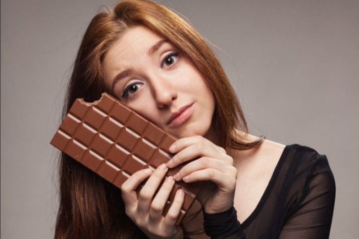 Just make sure that you eat the dark variety that has more than 70 percent cacao in it, which automatically reduces the content of milk, sugar and butter in it that makes the chocolate fatty. Also, try and restrict your consumption to around 200 grams or about four dark chocolate bars a week
