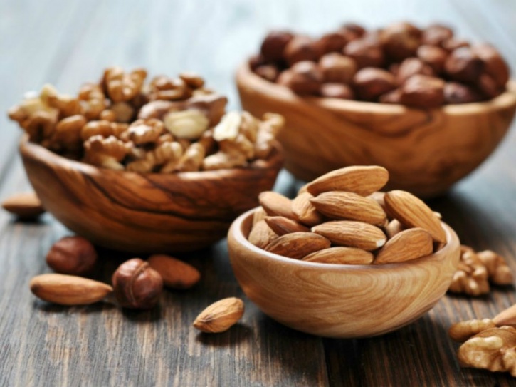 Nuts such as pecans and almonds are not only packed with protein and antioxidants, but also add a crunch to your salads and pulses while satiating you.