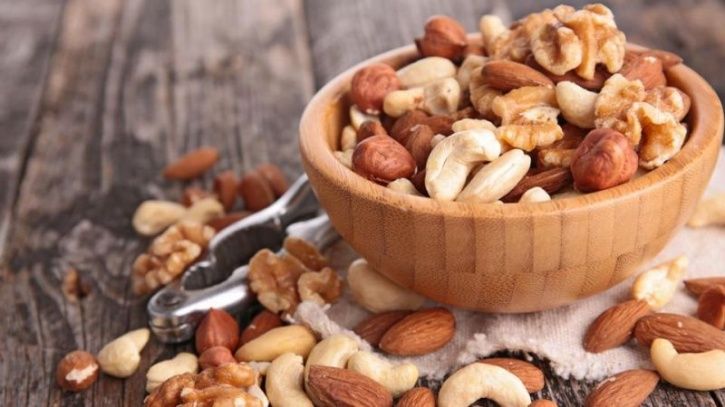 Walnuts contain the amino acid L-arginine, which is one of the primary building blocks of nitric oxide; a naturally occurring gas that helps men maintain their erections. Cashews on the other hand are loaded with zinc; an mineral that improves your testosterone production