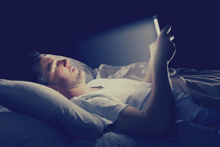 Switch off from staring into a screen well before bedtime