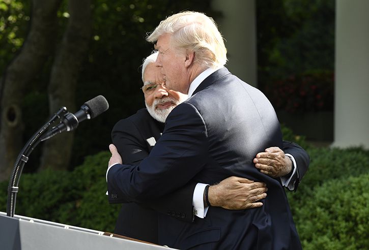 Modi hugs Trump
