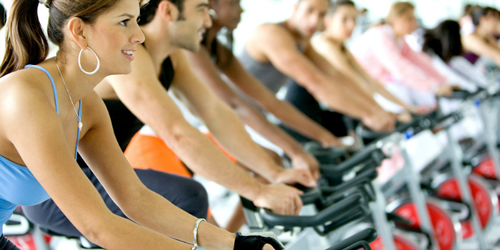 . The additional motivation, which is a huge component if your use the stationary bike in a spin class, such as the pounding music, group atmosphere and motivation from the instructor can help keep urging you on
