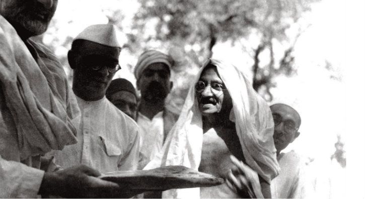 Gandhi and Mahadev Desai with Khan Abdul Ghaffar Khan at Utmanzai in 1938