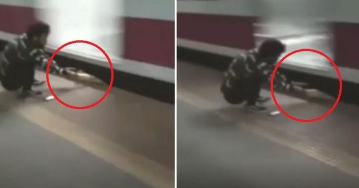 Man Gets Stuck Between Running Train and Platform