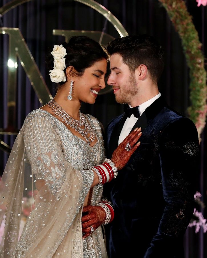 See Priyanka Chopra's 75-Foot Veil as She Walks Down the Aisle to Marry Nick  Jonas