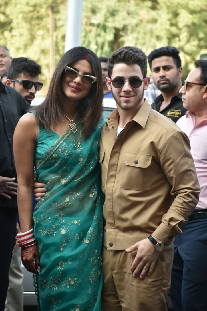 Priyanka Chopra & Nick Jonas Make Their First Appearance As Married Couple, Greet Fans With Namaste