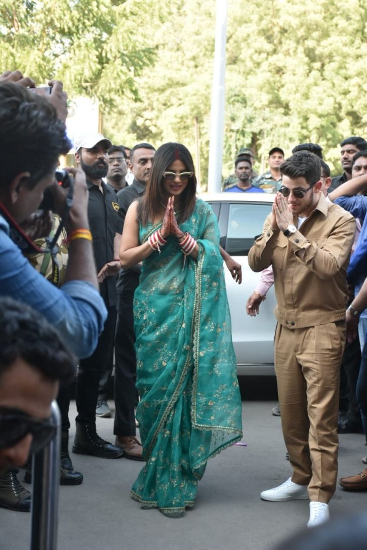 Priyanka Chopra & Nick Jonas Make Their First Appearance As Married Couple, Greet Fans With Namaste