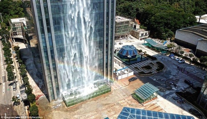 Chinese Skyscraper Boasts Of A 350-Foot Tall Artificial Waterfall Streaming Down