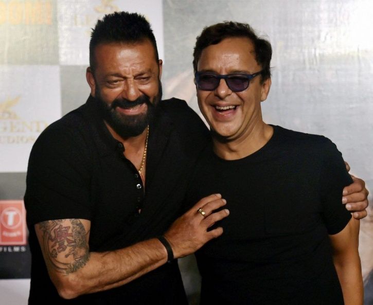A picture of Vidhu Vinod Chopra  and Sanjay Dutt at the launch of Sanju.