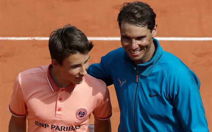 The French Open Has An Unscheduled Match As Rafael Nadal Rallies With A Ball Boy After Entering Pre Quarters