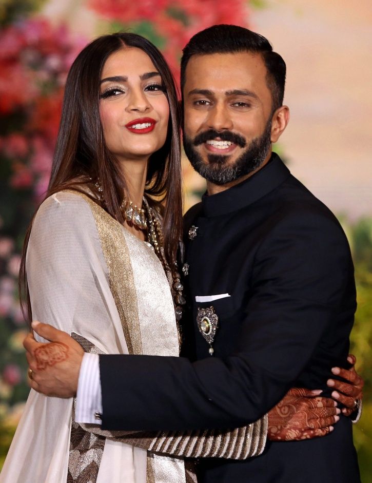 A picture of the newly wedded couple Sonam Kapoor and Anand Ahuja flaunting their engagement ring. 