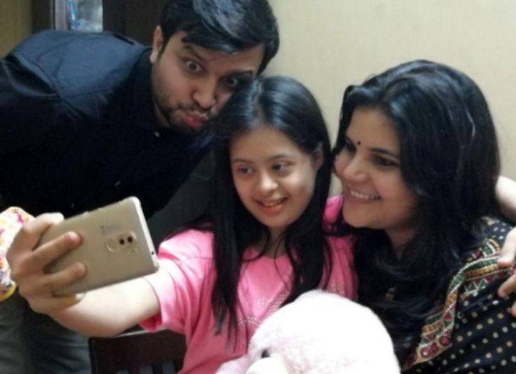 Ranjan Sharma along with her daughter Vilina and his wife 