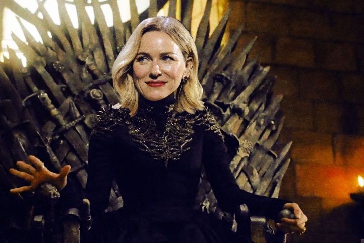 A picture of Naomi Watts sitting on the Iron Throne of Game of Thrones prequel. 