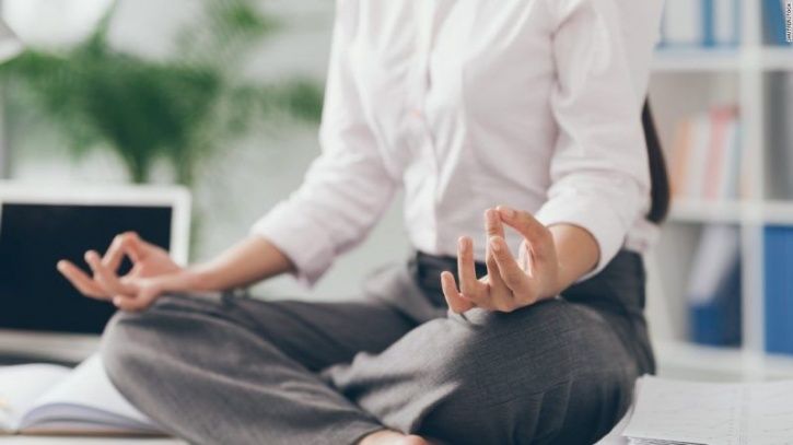 Here’s How Meditation Can Boost Your Emotional Intelligence & Well-Being At Work