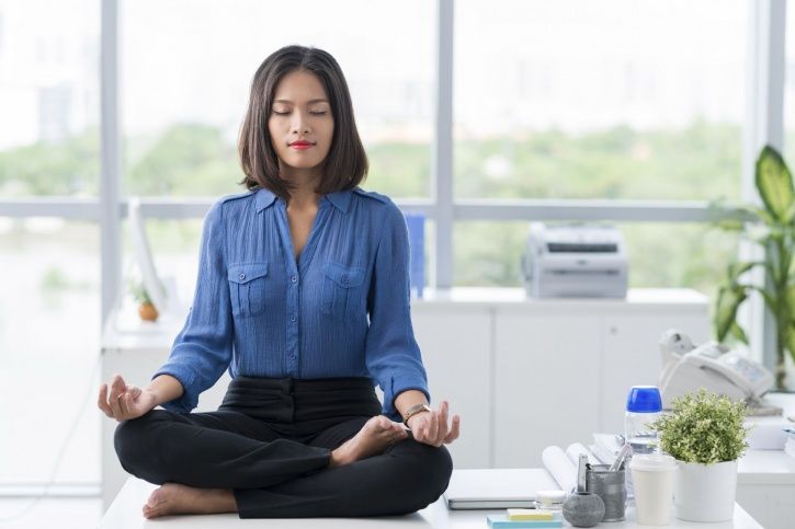Here’s How Meditation Can Boost Your Emotional Intelligence & Well-Being At Work