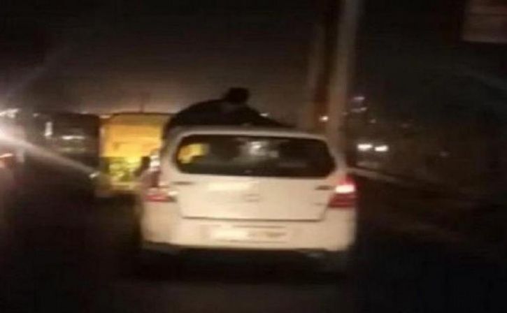 man clings to car roof for 6 km