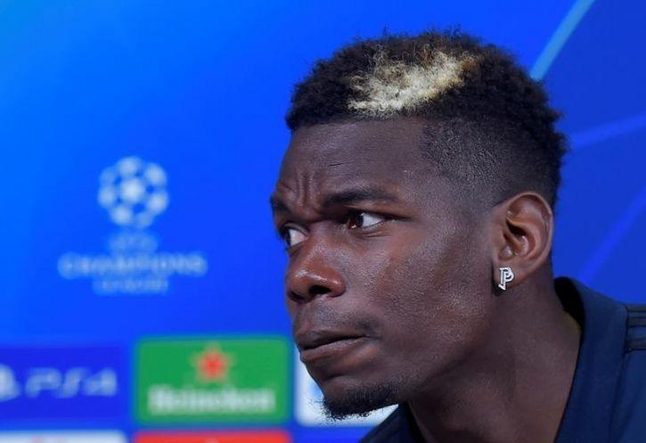 Paul Pogba is happy at Manchester United