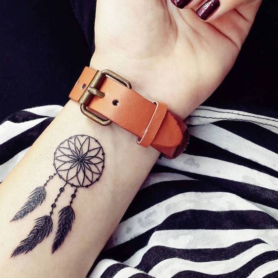 free spirit symbol tattoo