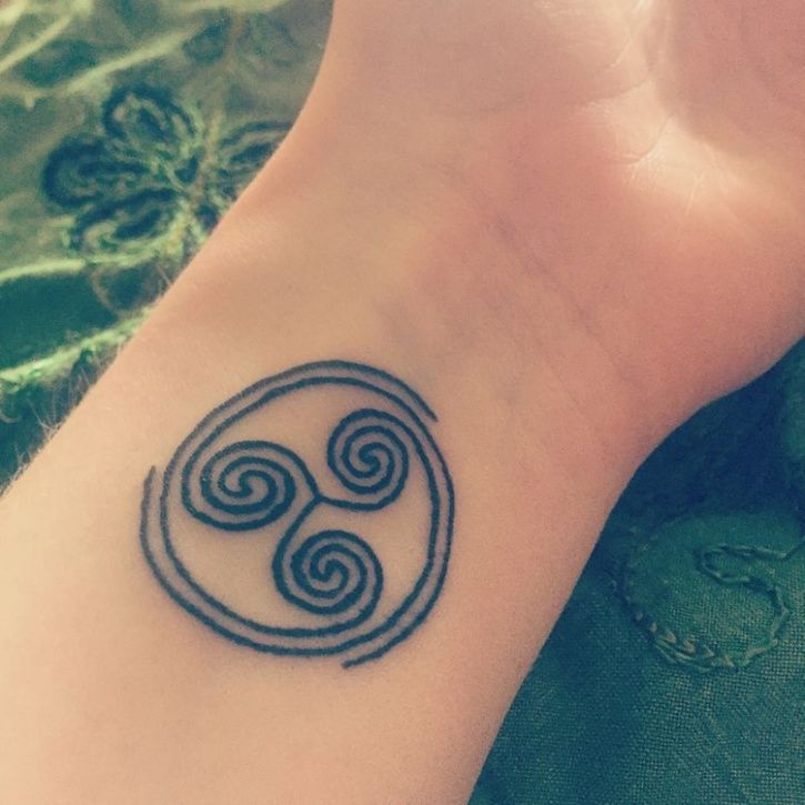 free spirit symbol tattoo