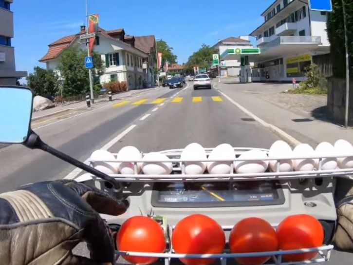 This Guy's Bike Has A Rack Full Of Eggs & Tomatoes To Throw At Cars