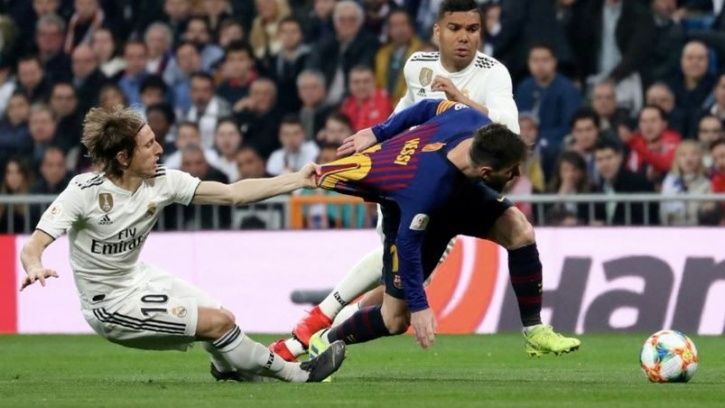 Luka Modric pulled down Lionel Messi